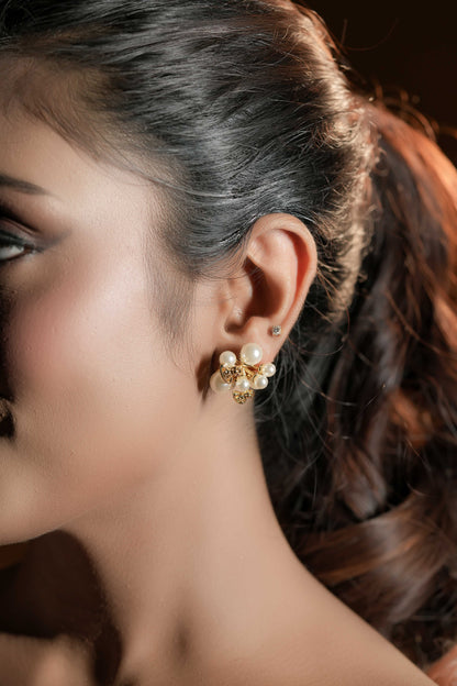 Sparkling golden pearl studs